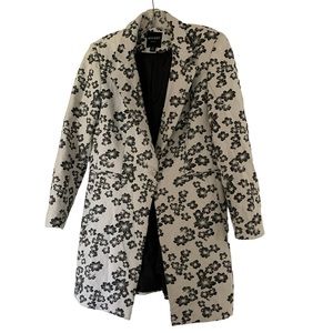 INSIGHT New York white with black flower shapes 3/4 coat.